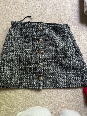 Plaid knit mini skirt with gold buttons